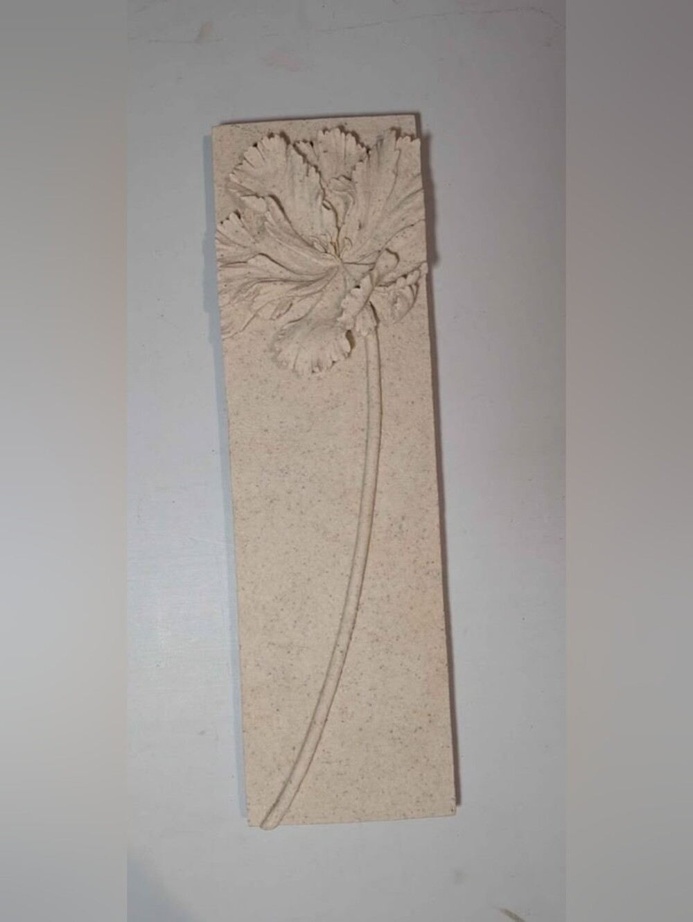 beige stone botanical flower wall sculpture